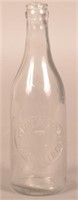 Harry W. Grimecy Embossed Clear Crown Top Bottle.