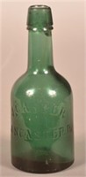 J. Casper Embossed Dark Green Squat Bottle.
