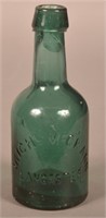 Michl. McGrann Embossed Blue/Green Squat Bottle.