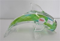 Hand blown glass dolphin. Measures 4" tall.