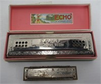 Marine Band harmonica and Echo harmonica in box.