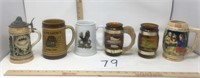 Six mugs and steins one has been repaired