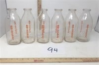 Six Bridgeman vintage milk bottles