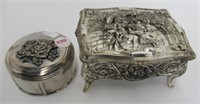 (2) Silver plated dresser boxes. Largest measures: