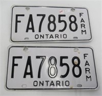 Matching pair of Ontario farm license plates.