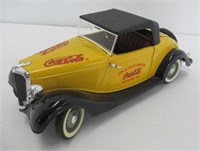 Die cast Coca-Cola roadster.