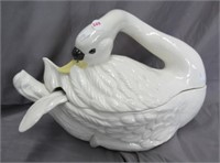 Ceramic soup tureen with ladle. Measures: 11"