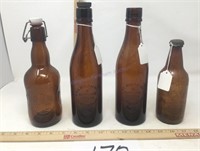 Four vintage  Brown bottles