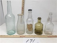 Five vintage unique bottles
