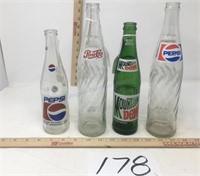 Vintage Pepsi and Mountain Dew bottles