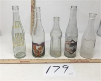 Five vintage unique soda bottles