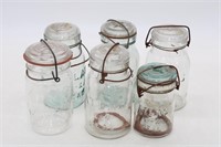 CLEAR CANNING JARS (1) HAS BLUE LID BAIL/GLASS