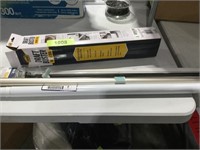 Assorted curtain rods, draft buster