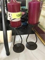 2 iron candle holders with burgundy candles