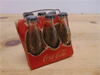 Tiny vintage CocaCola 6 pack.  Very neat