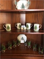 Christmas mugs, glasses & plates on 3 shelves