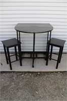 TABLE AND 2 NESTING STOOLS
