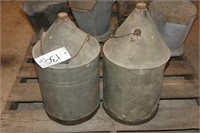 Two Old Galvanized Gas Cans