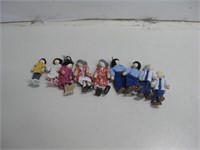 Nine Wooden Dolls Pictured Tallest 4.5"