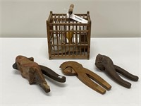 3 Carved Nut Crackers & Miniature Wooden Bird Cage
