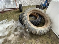 2 John Deere 10" rims, 1 good tire 11.2 x 38
