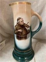 12.5 “ ANTIQUE PITCHER W/MONK PLAYING VIOLIN