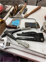 Crescent wrench, square, saws, etc