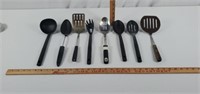 8 kitchen cooking utensils.