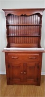 Antique maple stained hutch.