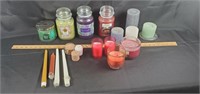 Over 15 assorted candles.