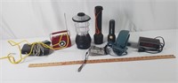 Collection of small electronics and flashlights.