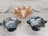 3 Carnival glass bowls. 2 swirl pattern and 1