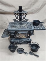 Cast iron Crescent miniature wood cook stove.