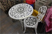 CAST IRON PATIO TABLE AND CHAIR