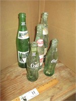 Five Soda Bottles