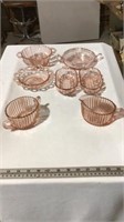 Vintage pink glass kitchen bowls and plate set.