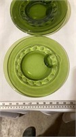 Vintage green glass kitchen plates and cups.