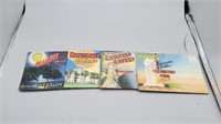 (B5) lot of 4 postcard books vintage - 3 have