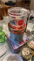 Four holiday tins and containers