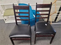 Pair of folding wooden chairs with padded seat