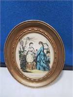 Gold oval frame print of ladies 6 in tall