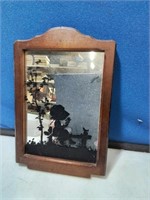 Framed mirror with relief of girls sitting on