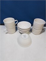 Set to four Farberware coffee cups and bowls