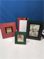 Group of four small new photo frames