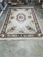 Beautiful five and a half foot by 7 ft area rug