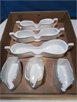 Group of six porcelain possibly spoon rest