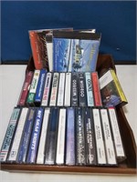 Wooden tray of cassettes and CDs