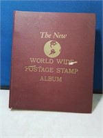 Worldwide postage stamp album with some stamps