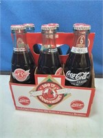Six pack of Coca-Cola Sports collectible bottles