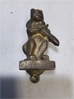 Brass feline door knocker
